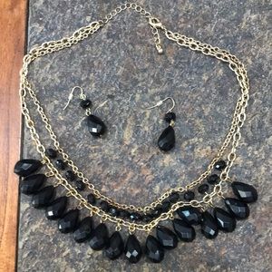 Charming Charlie black and gold beaded statement necklace and earrings
